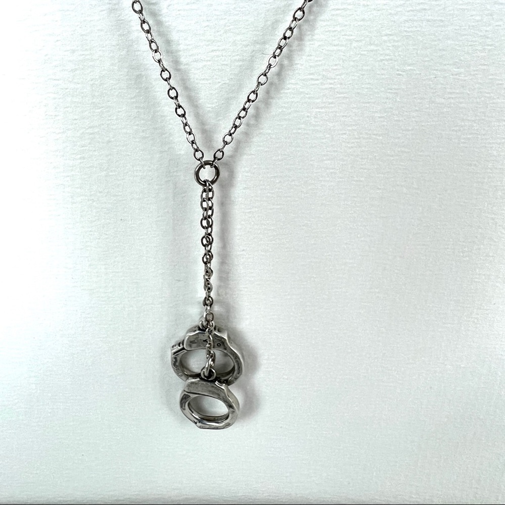 Moss Mills handcuff necklace